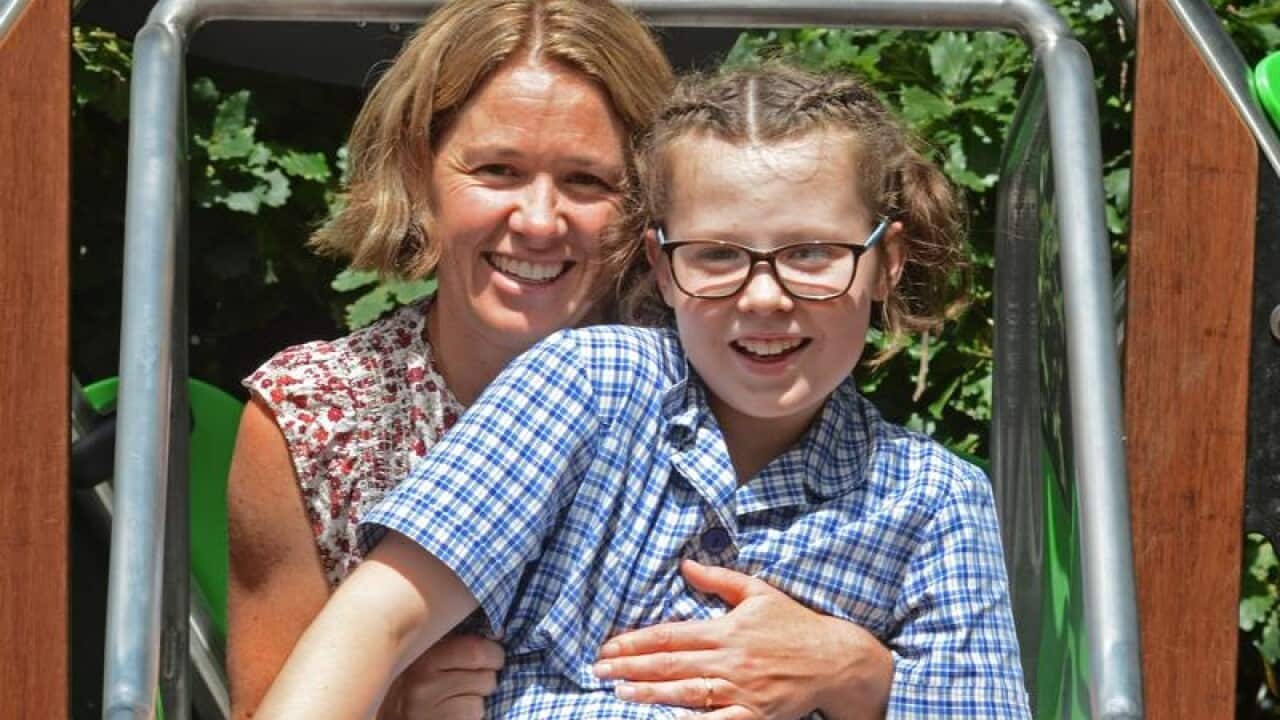 Georgina and her daughter Sophie pose for a photograph.