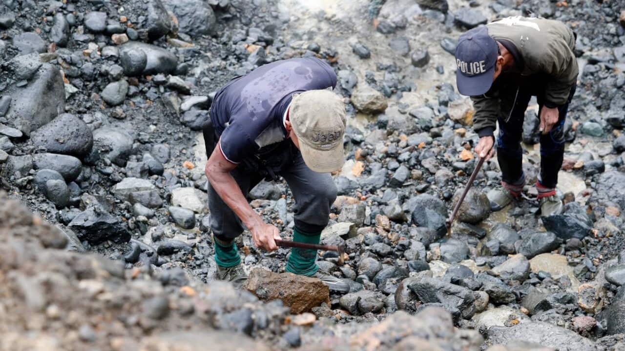 Miners search for Jade stones at the HpaKant jade mining area, Kachin State, northern Myanmar