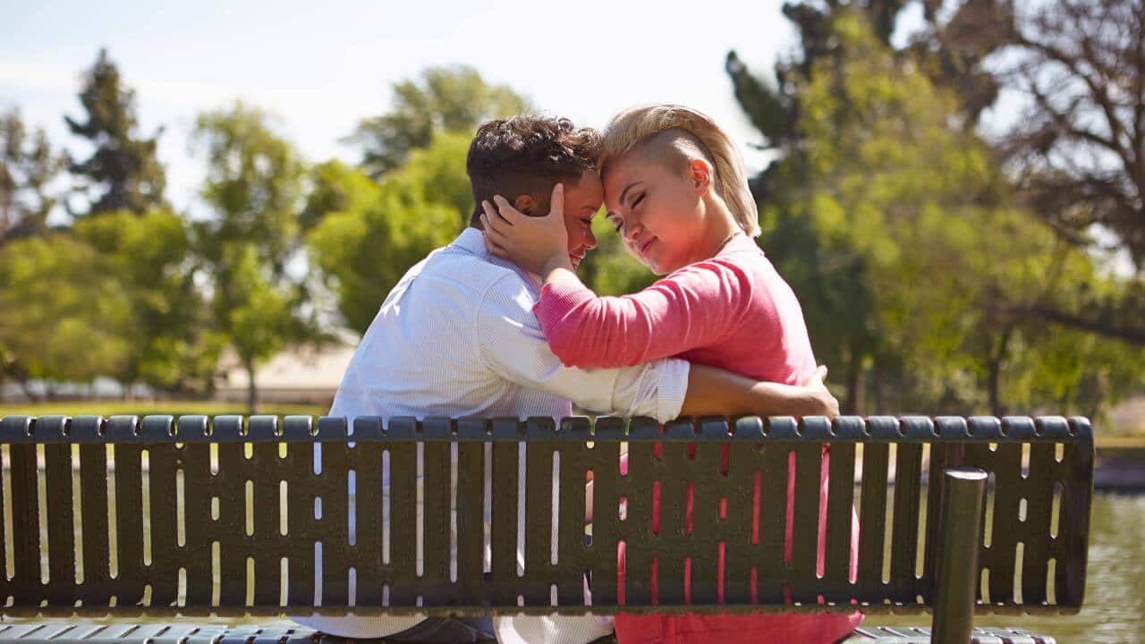 Lesbian couple embrace
