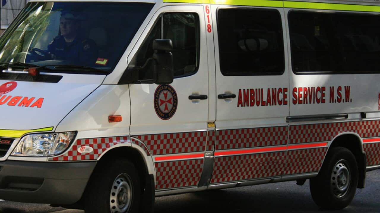 An ambulance drives through Sydney