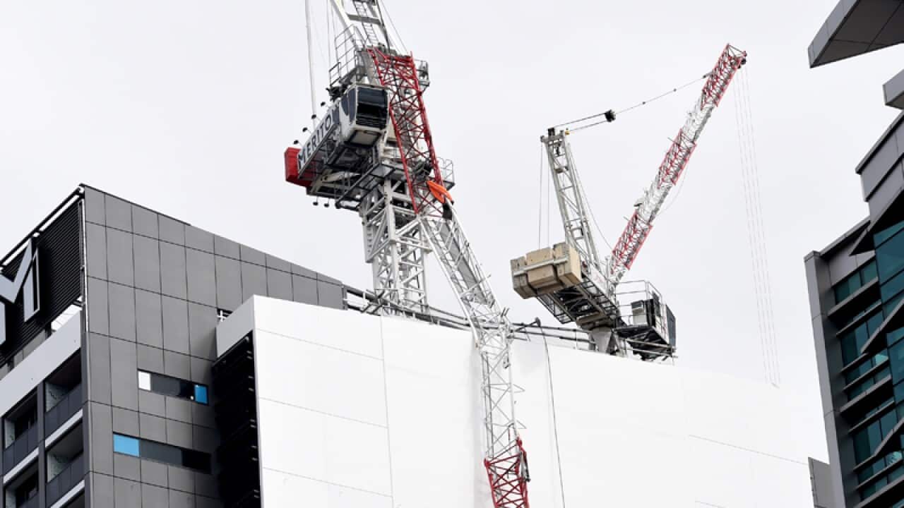 A collapsed crane on a high-rise building in North Sydney