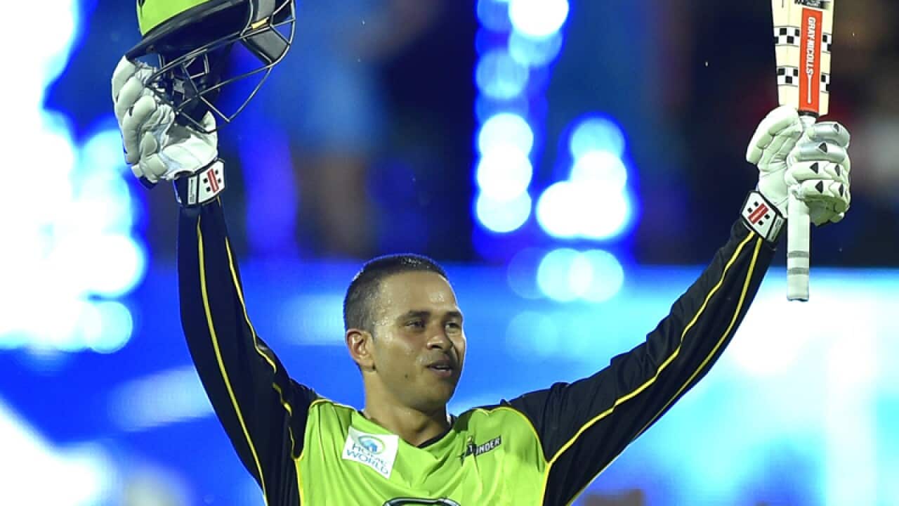 Sydney Thunder Usman Khawaja celebrates his 100 runs
