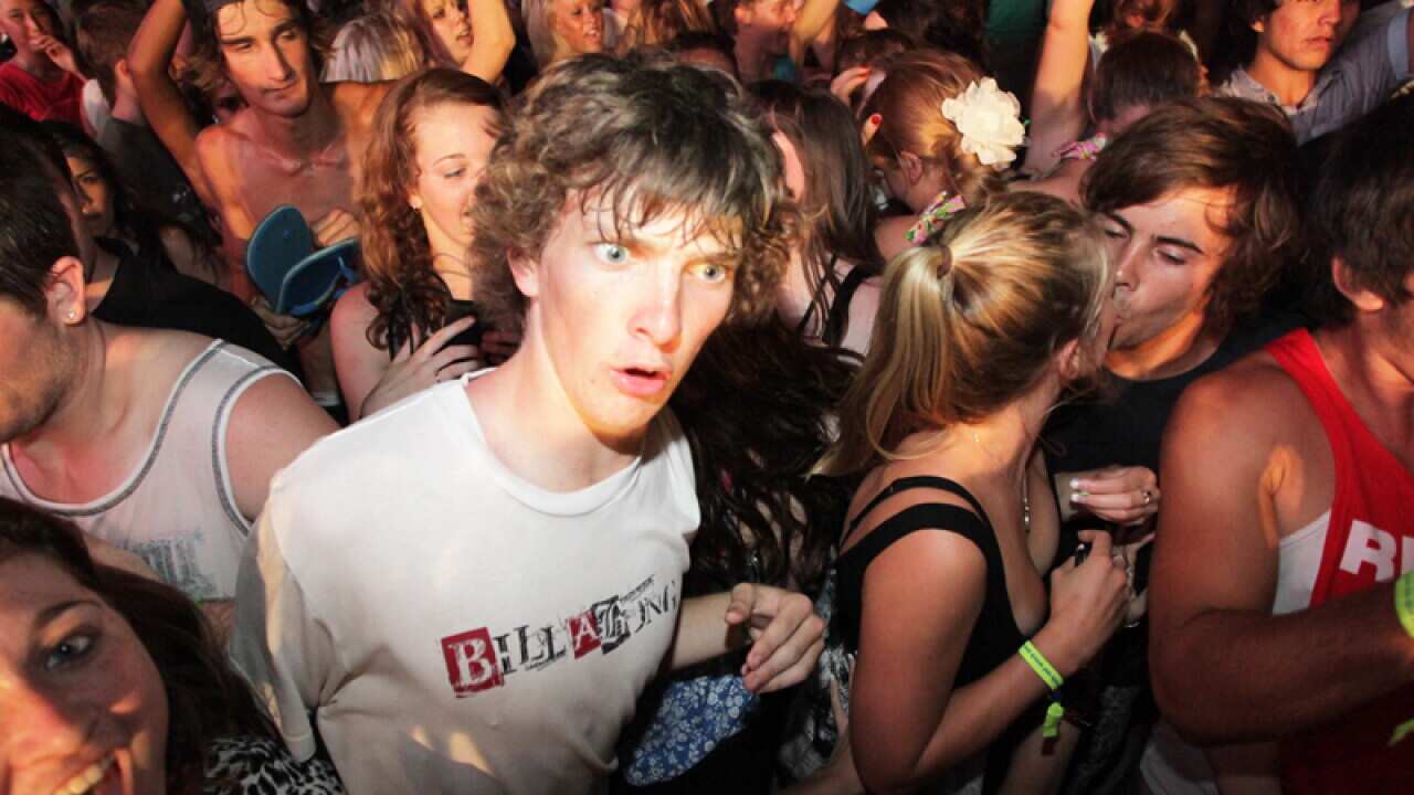 Young people party during the Schoolies festival on the Gold Coast