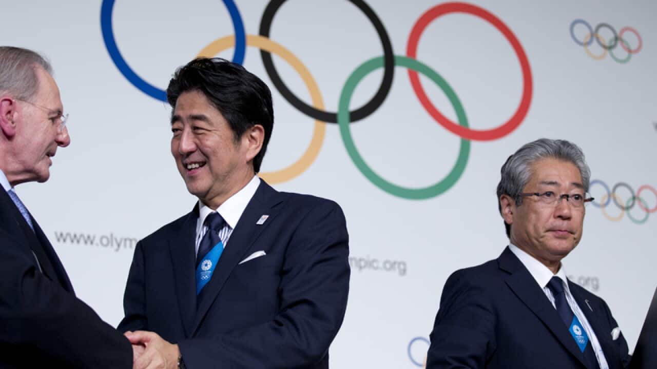 Shinzo Abe (C) with Jacques Rogge and Tsunekazu Takeda