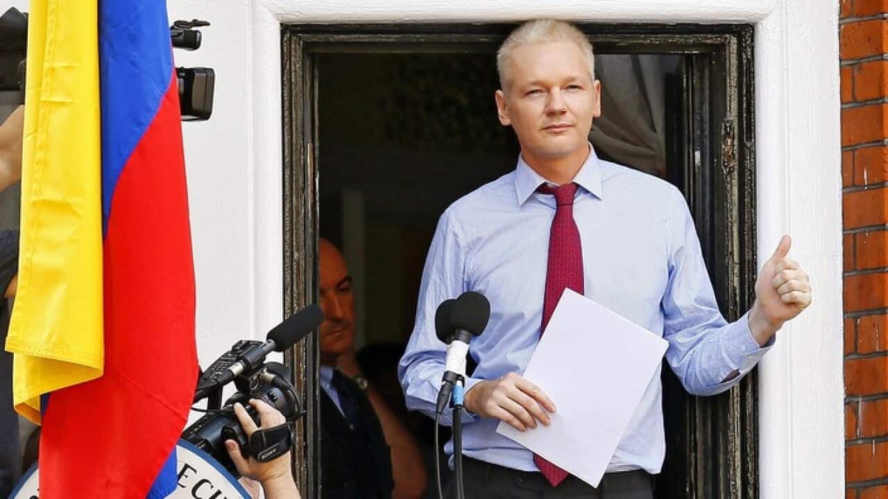 Julian Assange delivering a statement on the balcony of the Ecuador Embassy in London