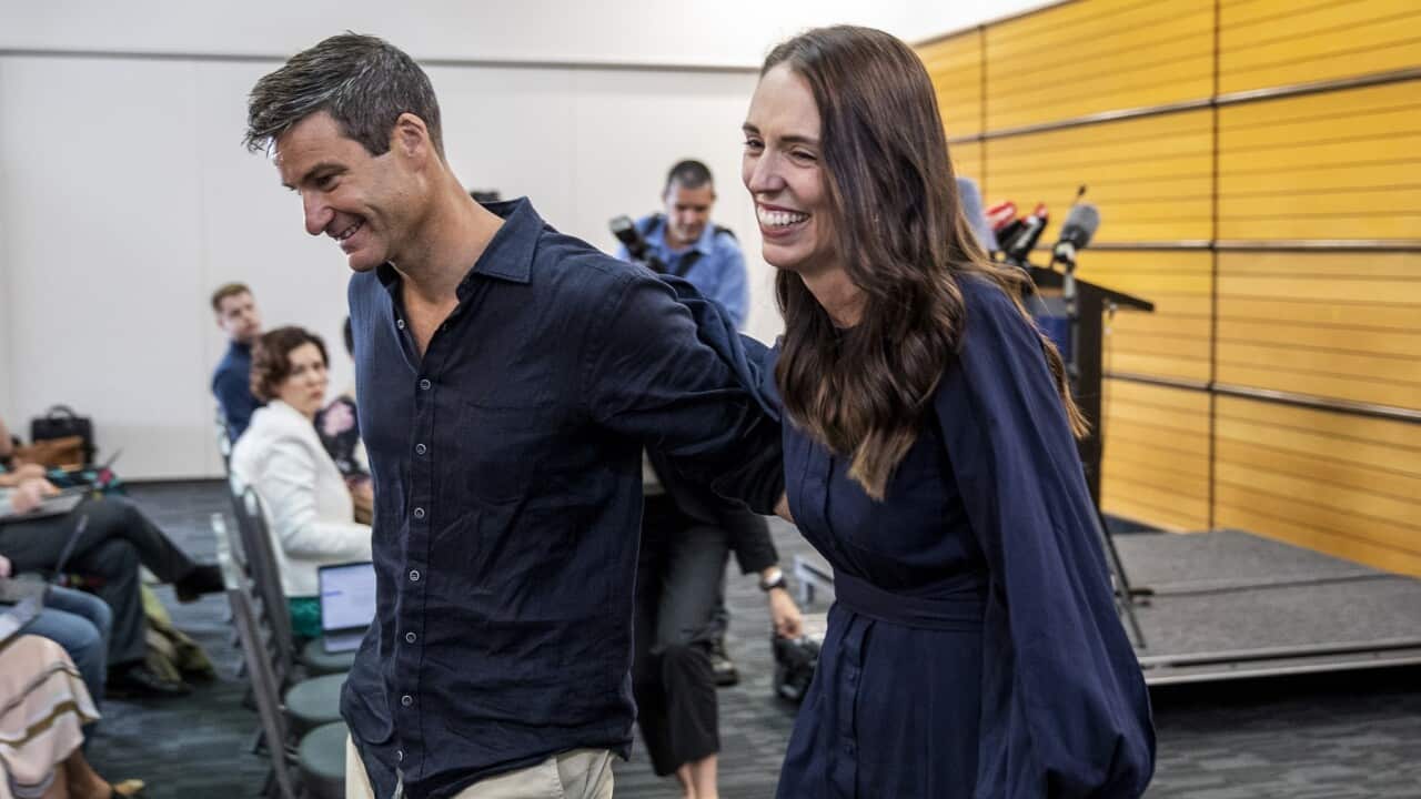 NZ PM Jacinda Ardern with her fiancee Clark Gayford leave a press conference after announcing her resignation
