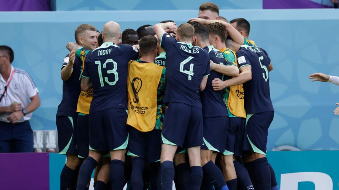 Australia players celebrate a goal