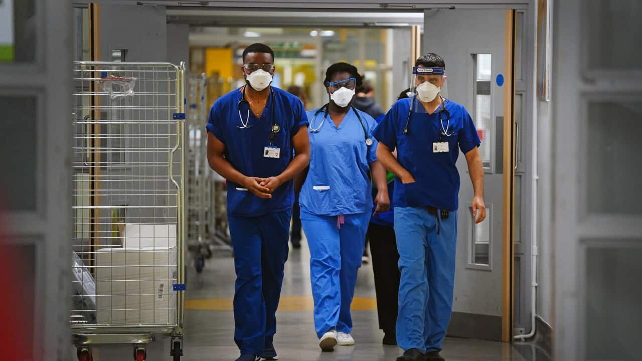 Medical staff wearing FFP3 face masks at King's College Hospital, in south east London