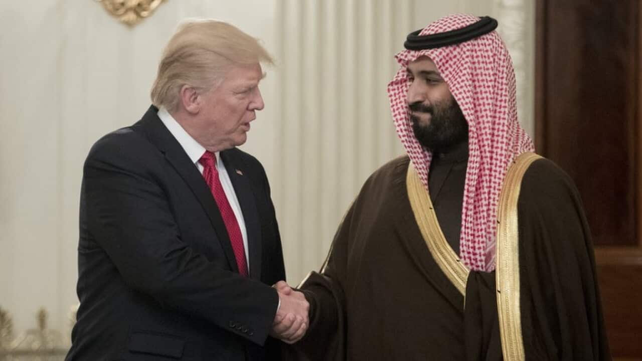 US President Donald J. Trump (L) shakes hands with Mohammed bin Salman bin Abdulaziz Al Saud
