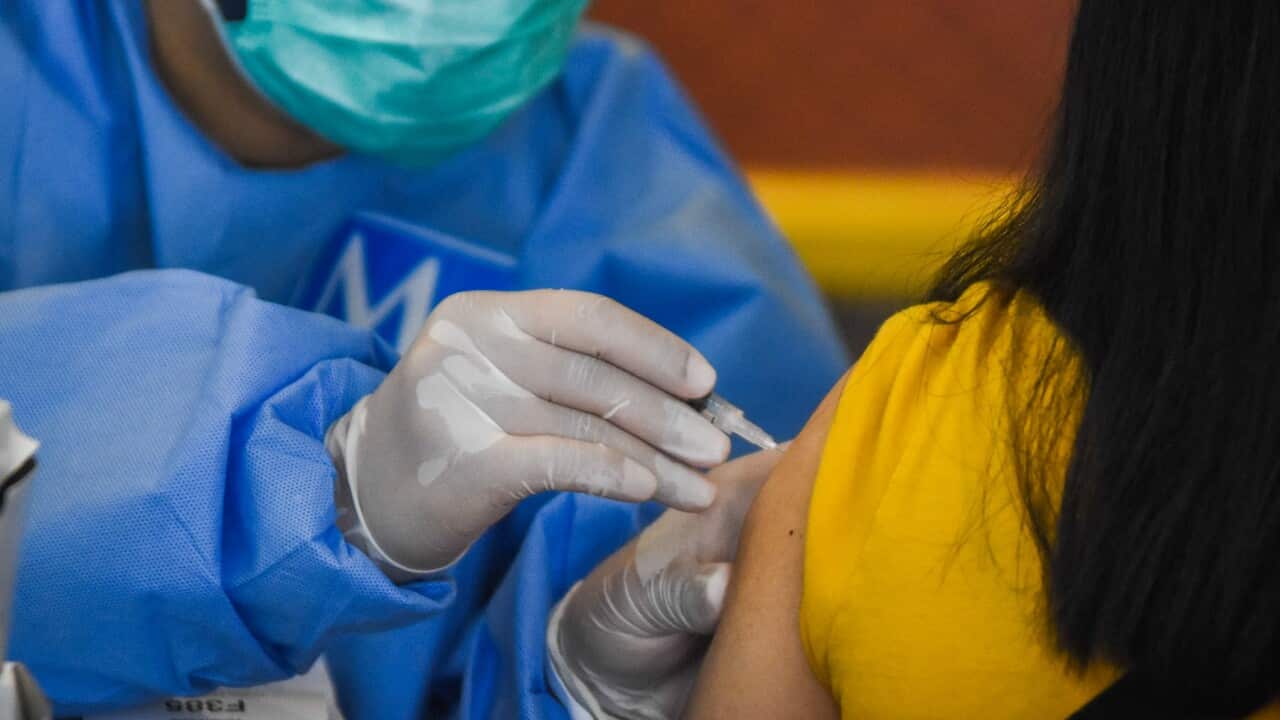 A vaccination booster is administered