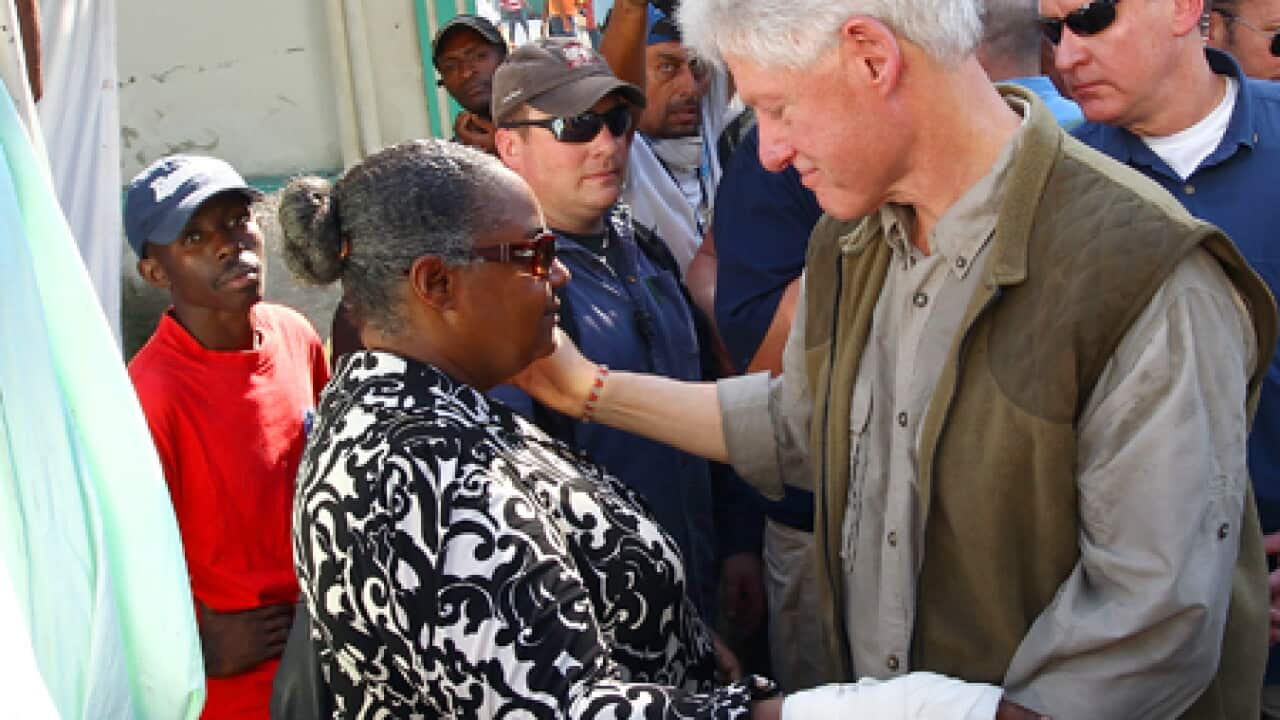 clinton_haiti_survivor_100119_B_getty_2034654555