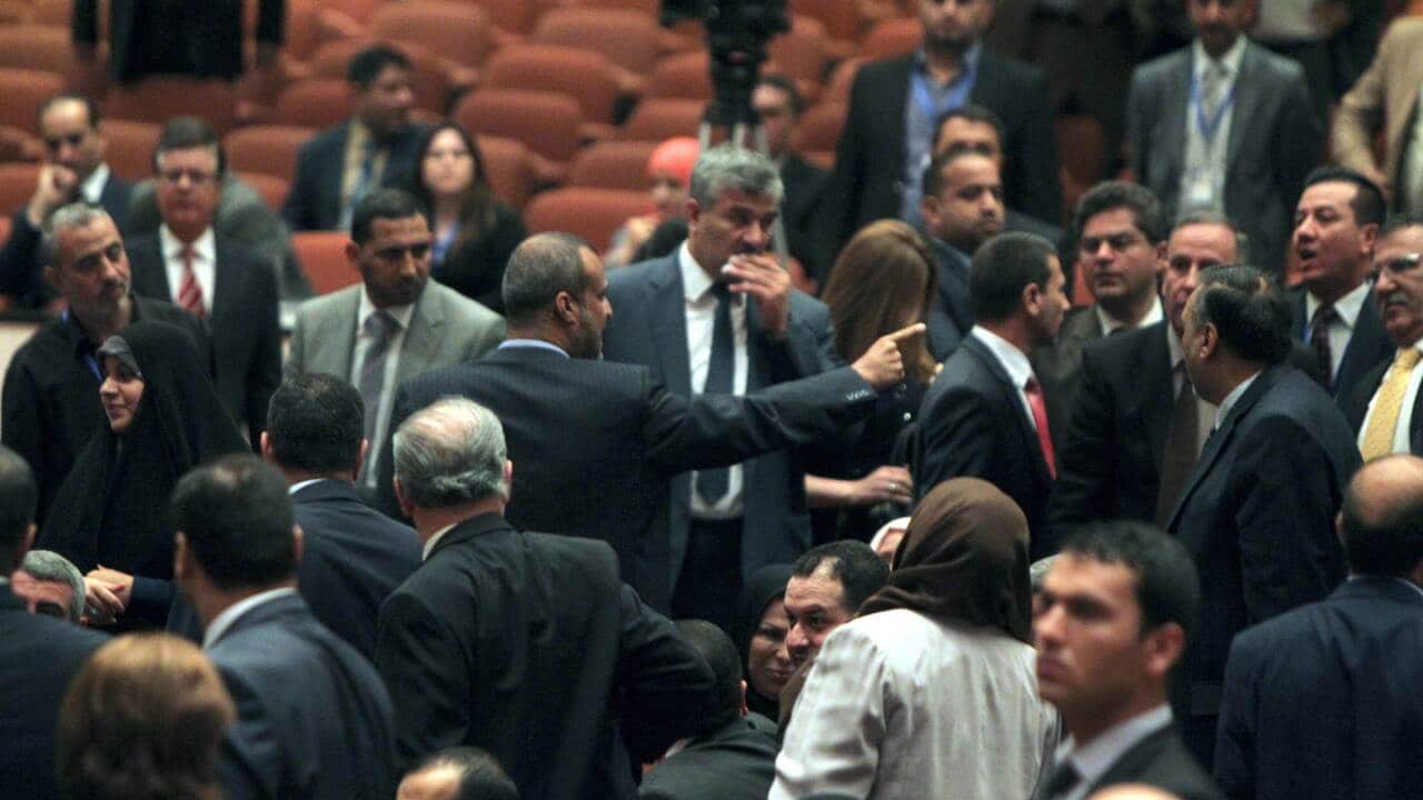 Iraq's new parliament descended into chaos with some lawmakers threatening each other and others walking out on July 1, 2014. (AFP)