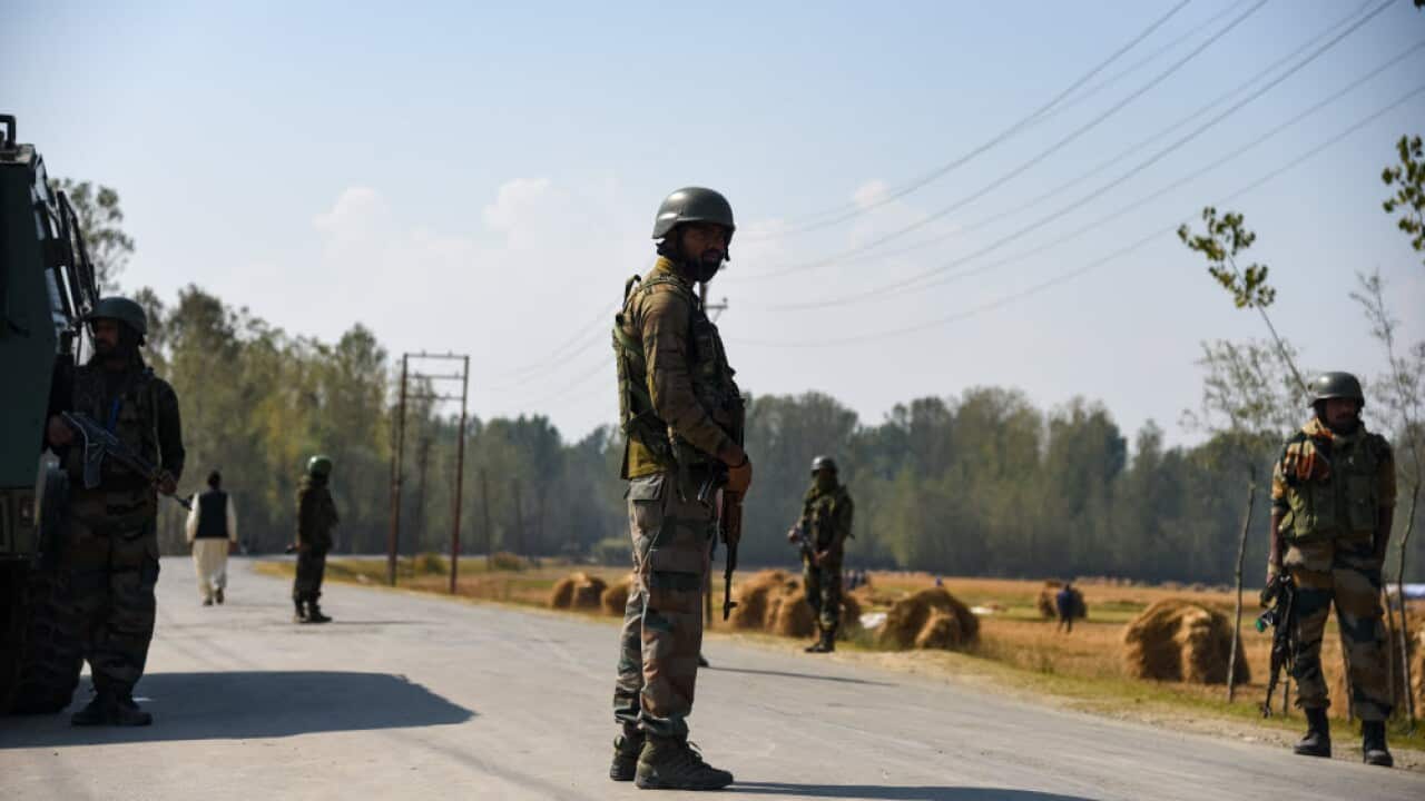 Indian army-men stand alert near Srinagar