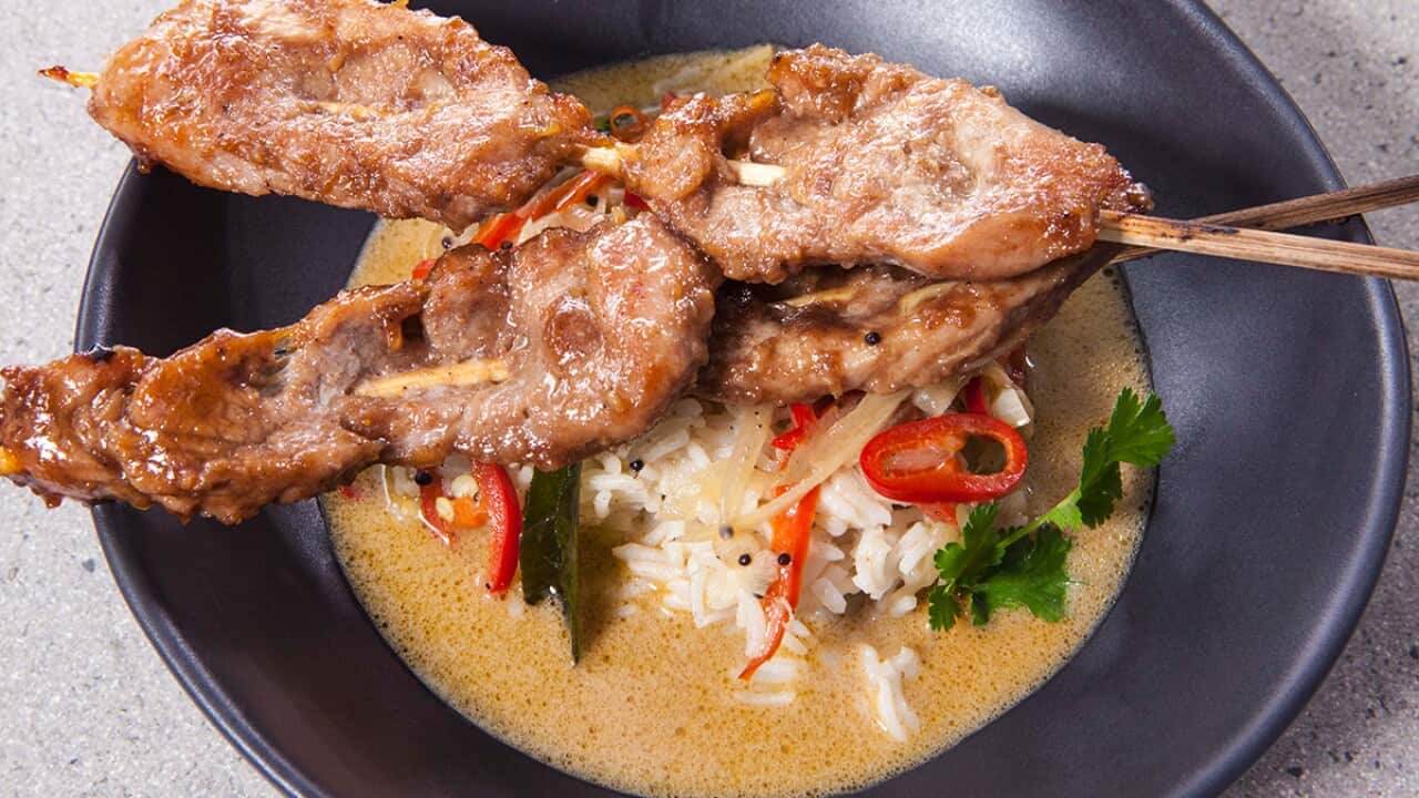 Spice grilled pork with noodles and coconut broth