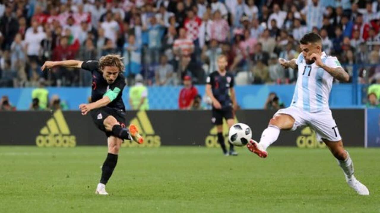 Croatia crush Argentina 3-0 to reach knockout stage