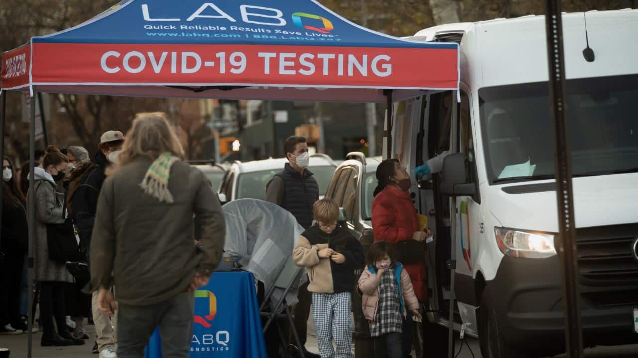Long lines at vaccination centres and mobile COVID-19 testing sites form all over New York City, as the Omicron variant of the coronavirus surges across the US.