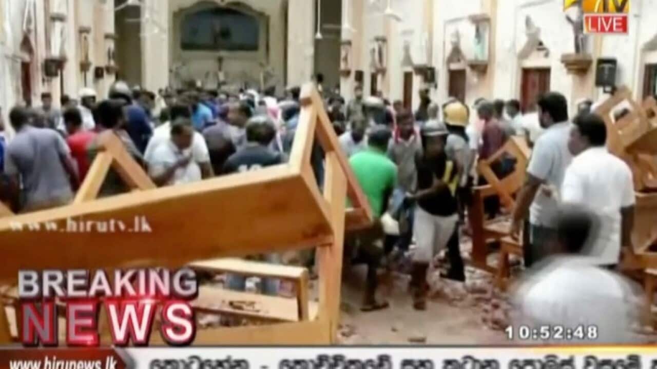 This image made from video provided by Hiru TV shows damage inside a church after a blast in Colombo, Sunday, April 21, 2019.