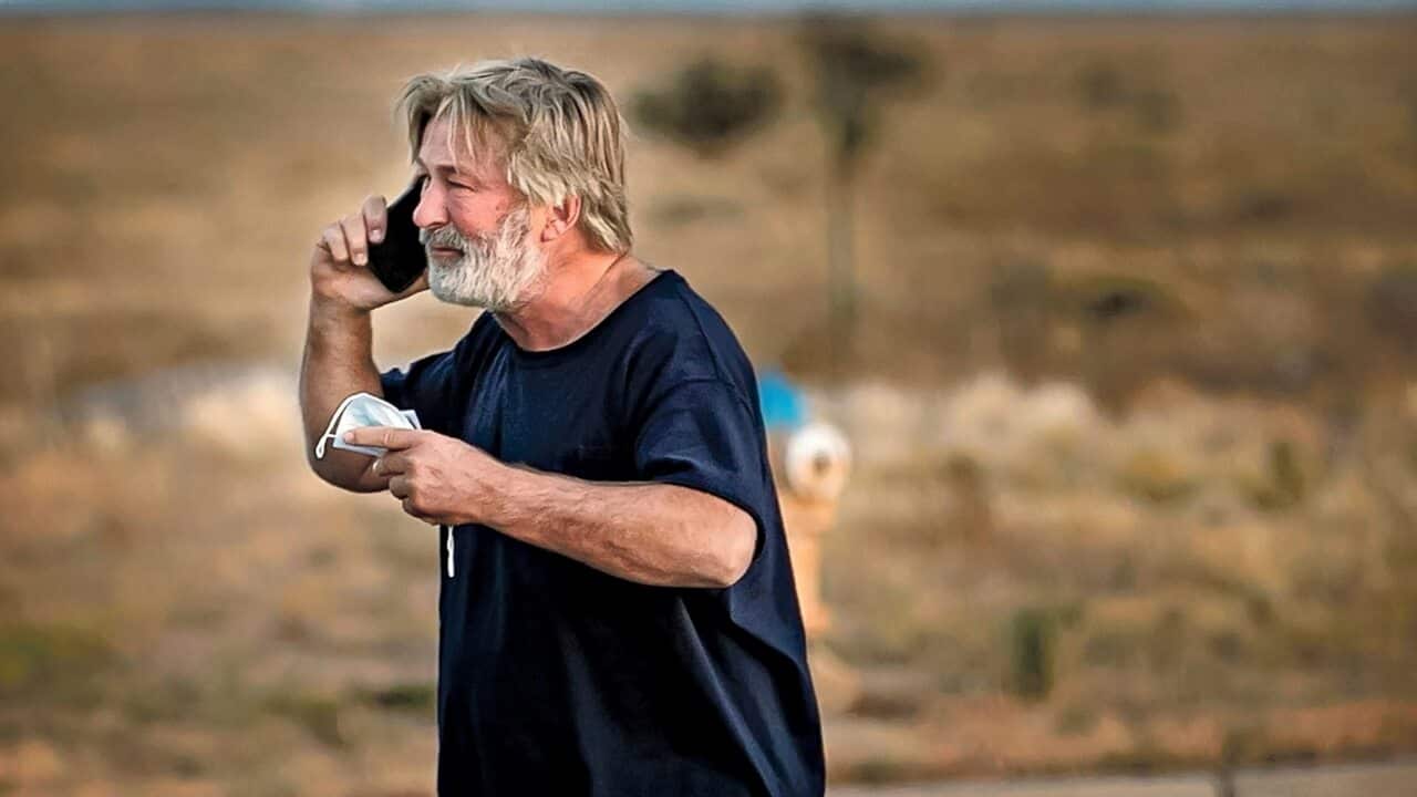 A distraught Alec Baldwin lingers in the parking lot outside the Santa Fe County Sheriff's offices on Camino Justicia after being questioned.