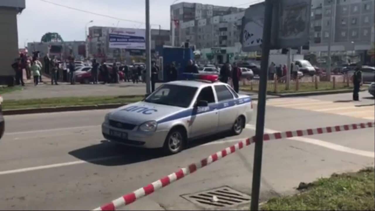 A man was shot dead by police after attacking and injuring at least eight people with a knife in Russia.