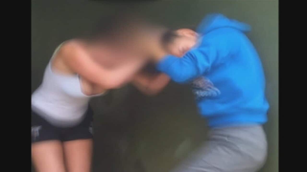 A fight between two teenage girls, filmed on a mobile phone. (Image: SBS Insight)