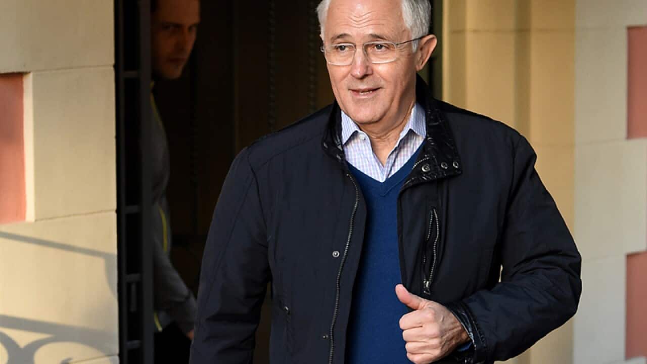 Malcolm Turnbull leaves his home in Sydney