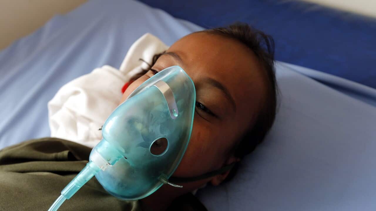 A wounded Yemeni schoolgirl after the explosion.