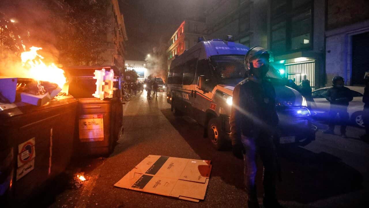 Police clash with protesters in Rome, Italy
