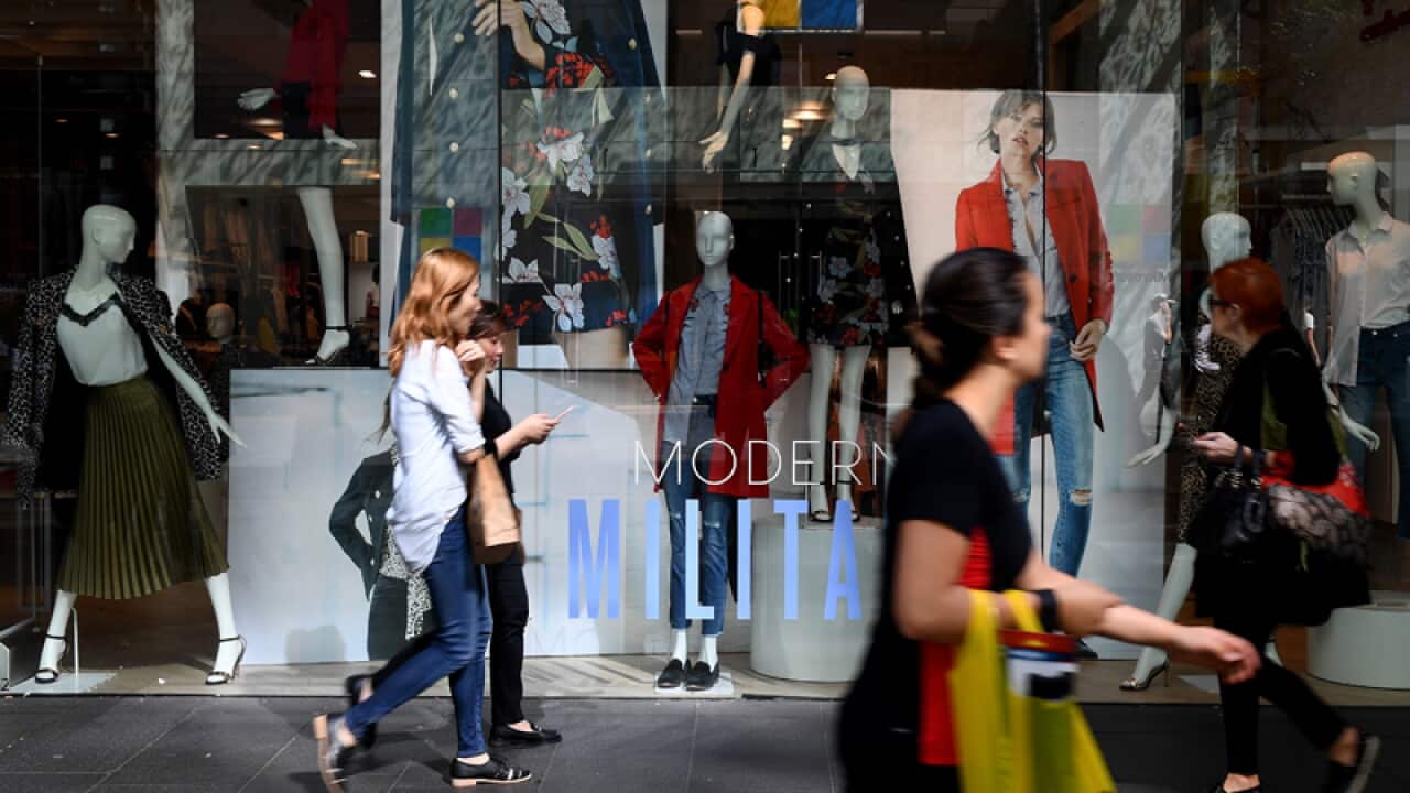 People are seen in Pitt Street Mall in Sydney