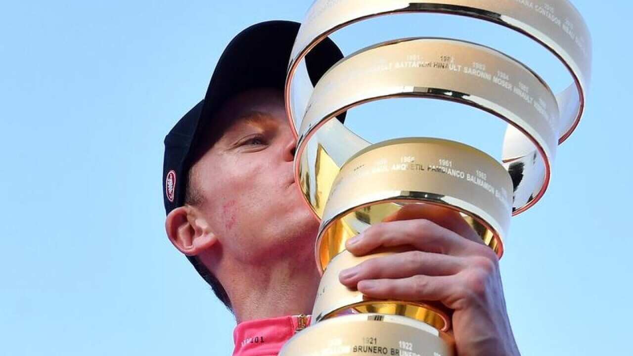 British cyclist Chris Froome with the Giro d'Italia trophy