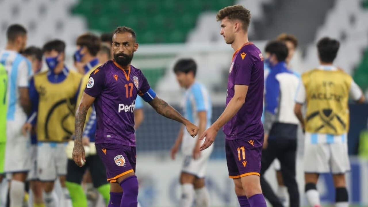 Perth Glory players react to their AFC Champions League defeat
