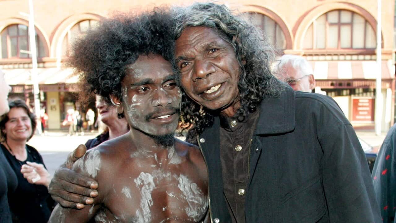 Yolŋu actor David Dalaithngu (right) poses for a photograph with his son Jamie Gulpilil