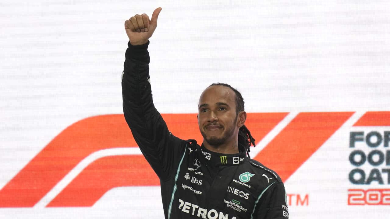 Mercedes driver Lewis Hamilton of Britain reacts after winning the Qatar Formula One Grand Prix. In Lusail, Qatar, Sunday, Nov. 21, 2021. (AP Photo/Darko Bandic)