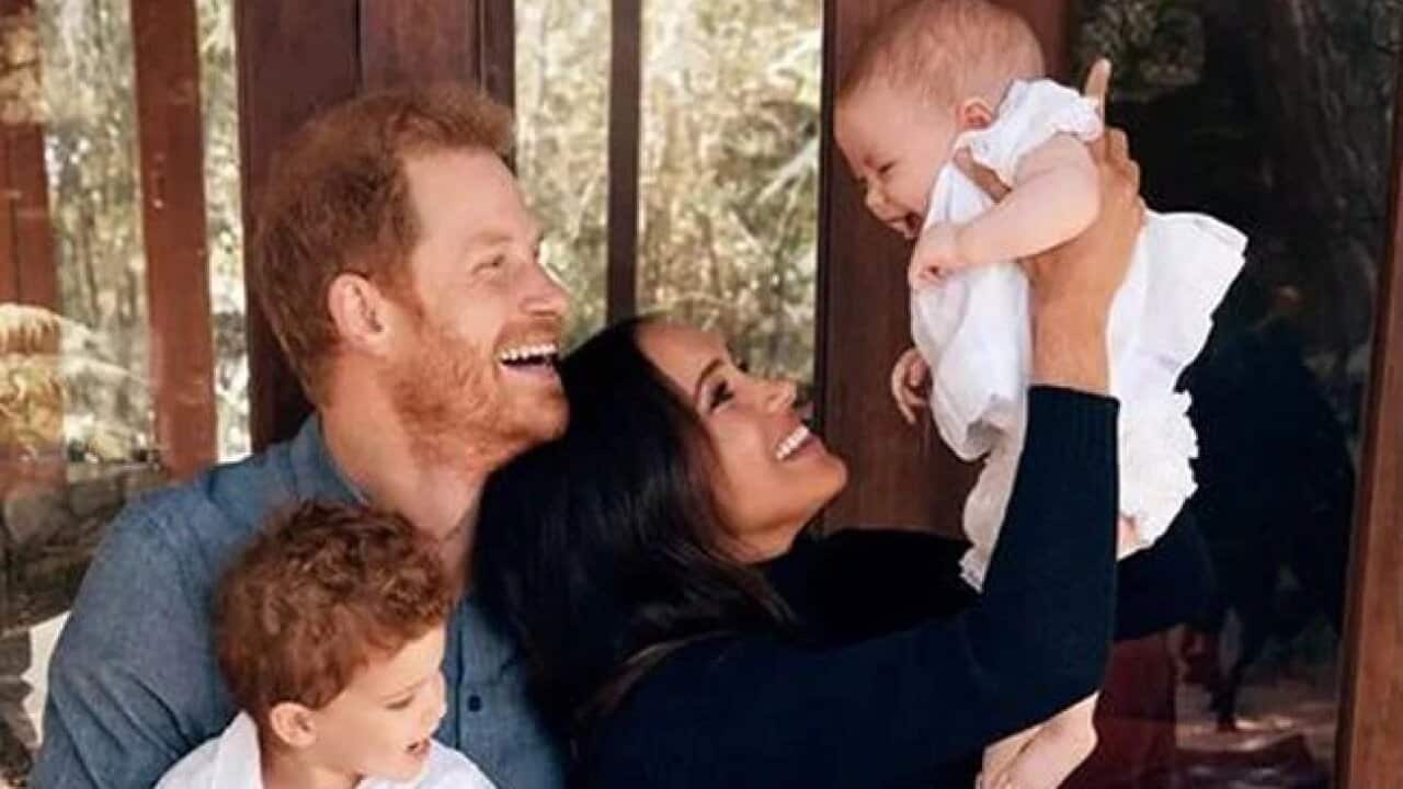 Prince Harry and Meghan Markle share the first image of their daughter Lilibet in their family Christmas photo