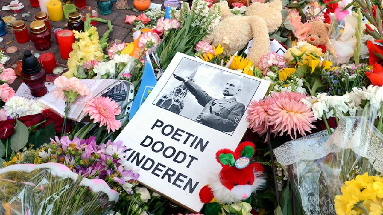 A message reads "Putin's Killing Children'