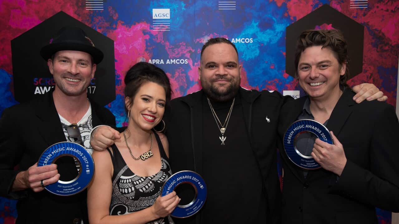 Members of Uncanny Valley with indigenous rapper Briggs