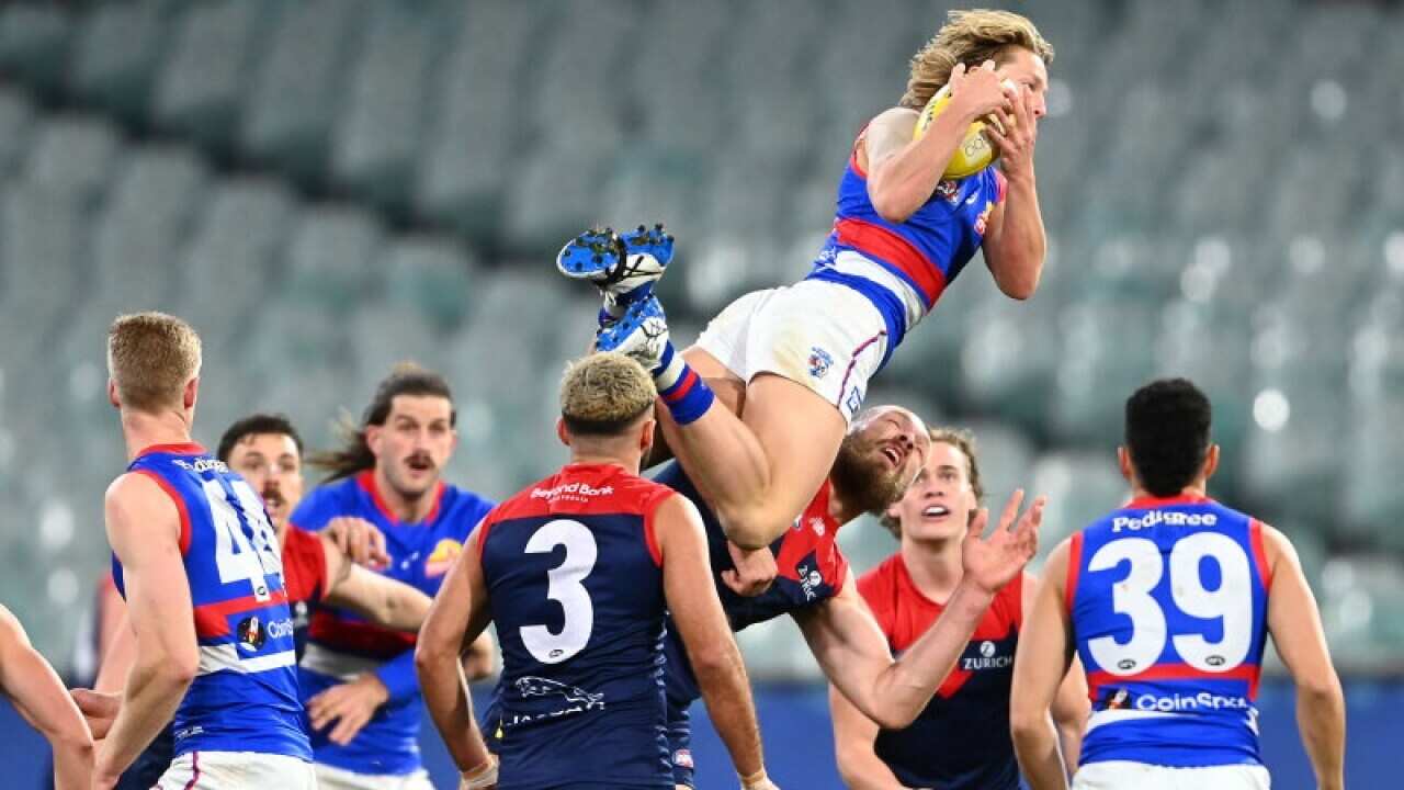 Cody Weightman takes a spectacular mark (catch.)