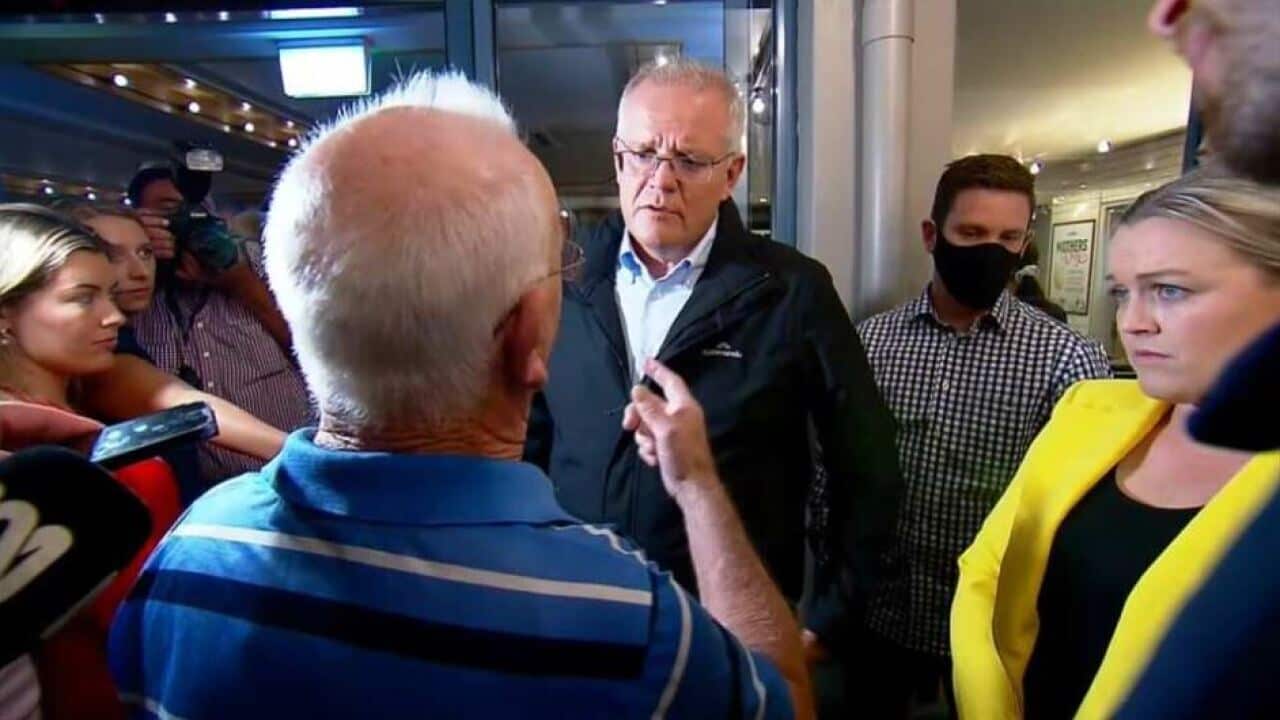 Prime Minister Scott Morrison was confronted by a disability support pensioner at Edgeworth Tavern in NSW's Newcastle region
