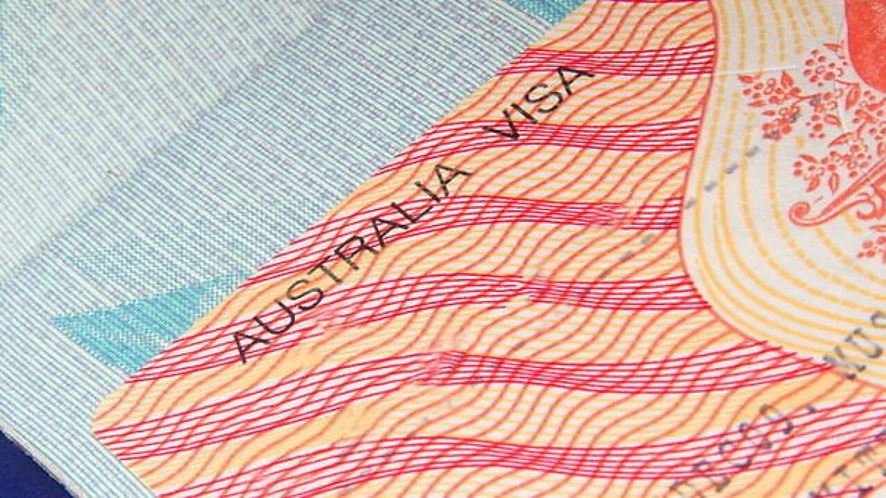 closeup of australian visa in passport