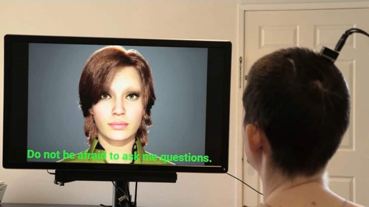 A woman unable to speak communicates via an AI neural recording device.