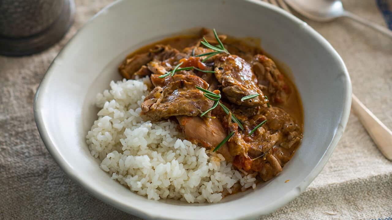 Chicken thigh casserole with rosemary, garlic, tomato and anchovies