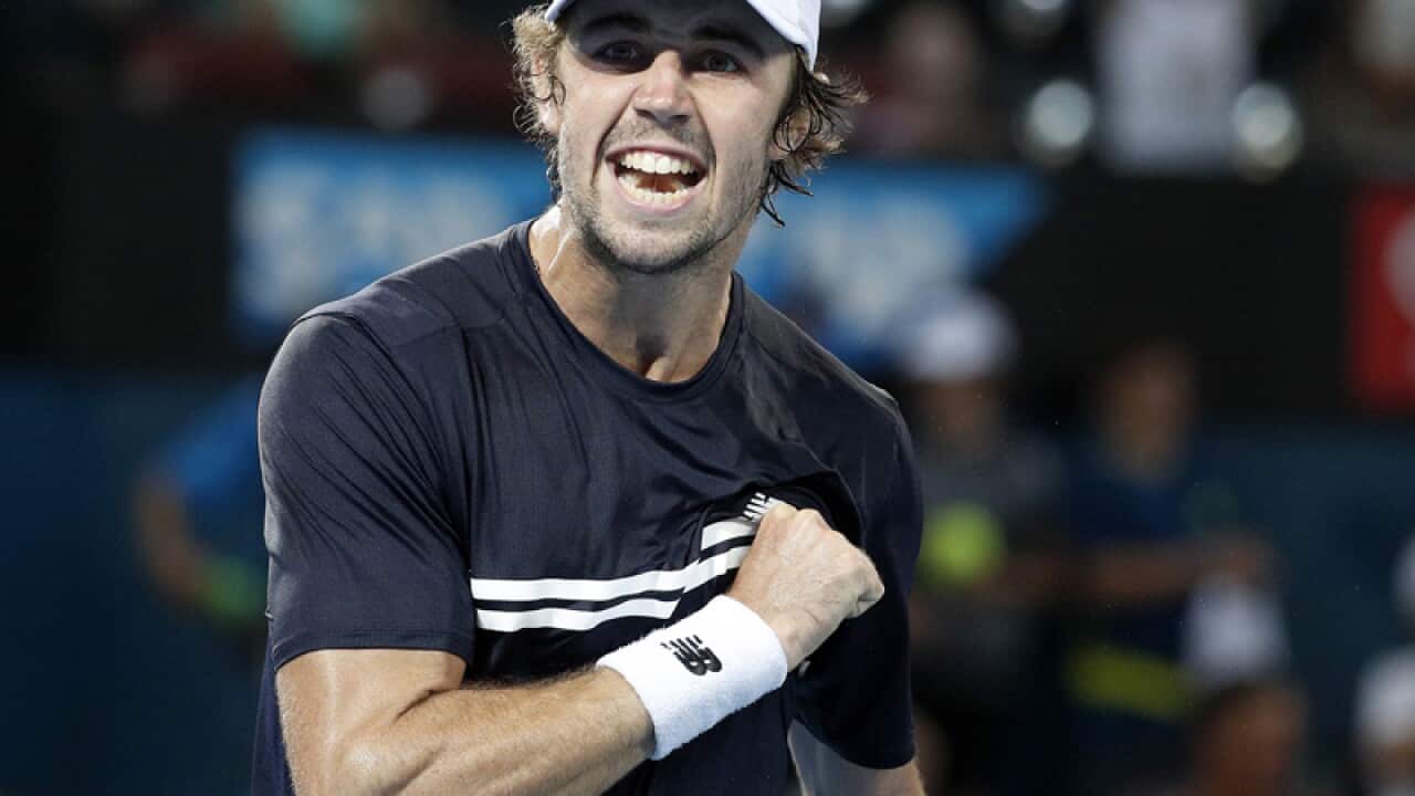 Australia's Jordan Thompson reacts after defeating David Ferrer