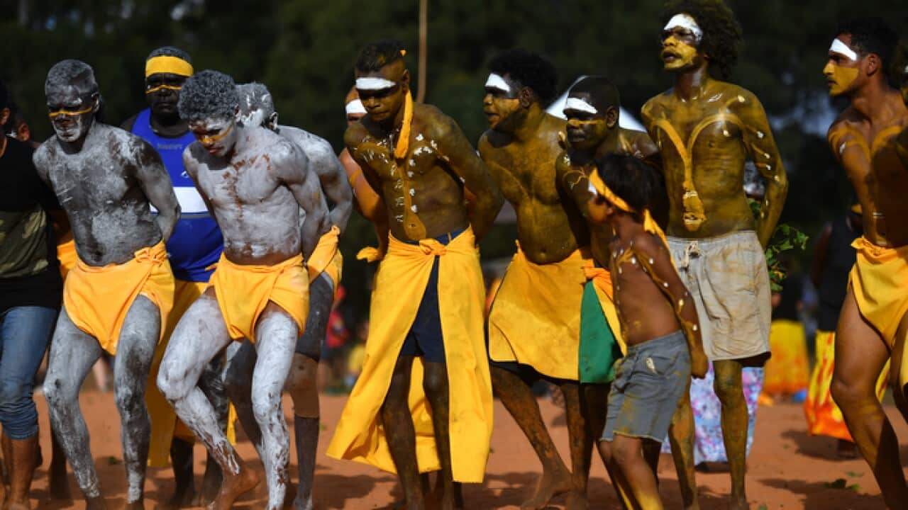 Clan members of the Yolngu people from north-eastern Arnhem Land perform the Bunggul dance during the Garma Festival near Nhulunbuy, East Arnhem Land.