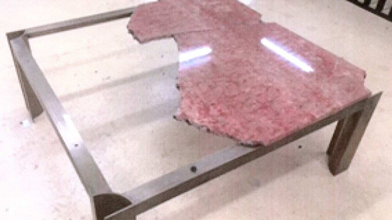 A broken marble table.