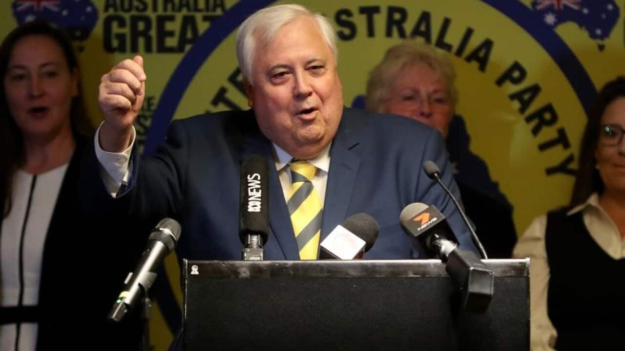 Clive Palmer says results should not be released until the last polls in Western Australia have closed.