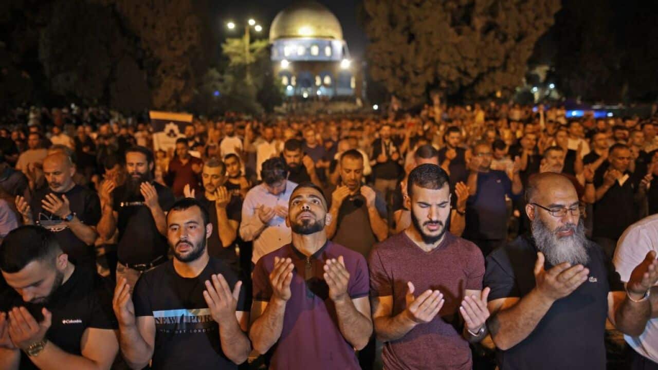 Palestinian devotees pray at Jerusalem's Al-Aqsa Mosque compound during the Muslim holy month of Ramadan.