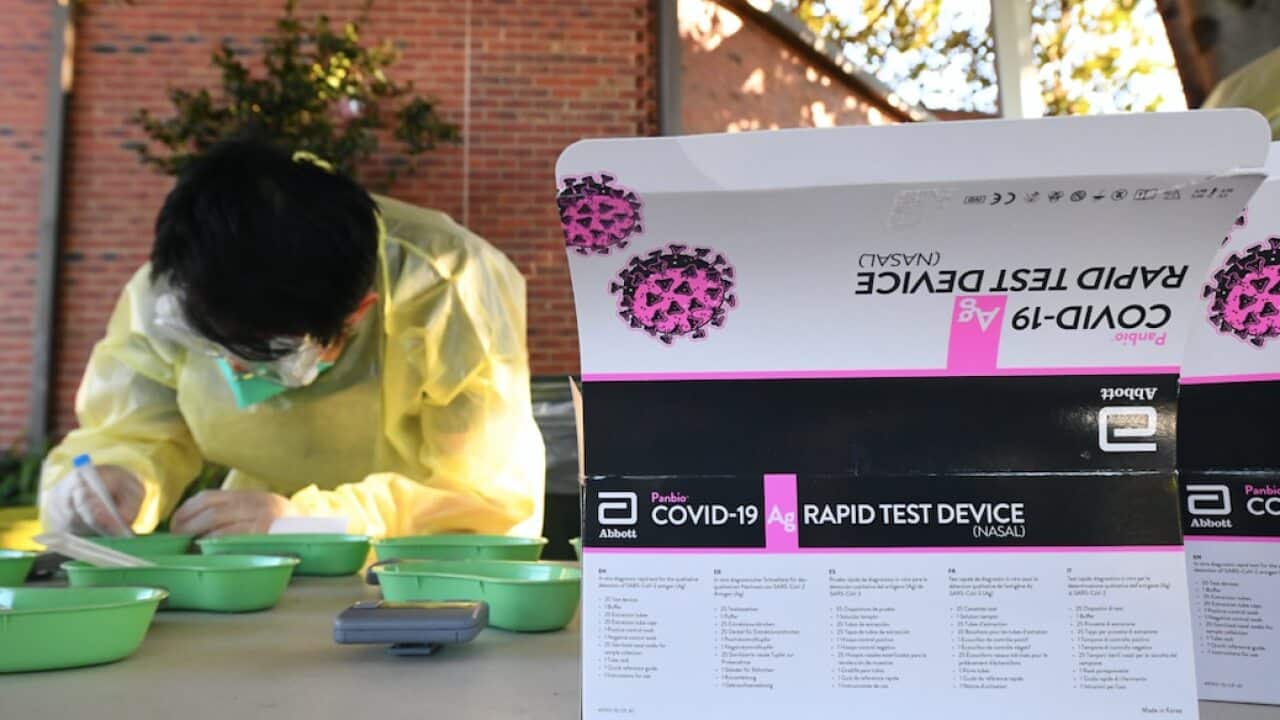 A rapid antigen test sits on a table at Firbank Grammar School in Brighton, Melbourne, October 14, 2021