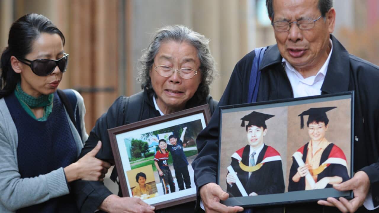 Robert Xie's mother-in-law Feng Qing Zhu (C)