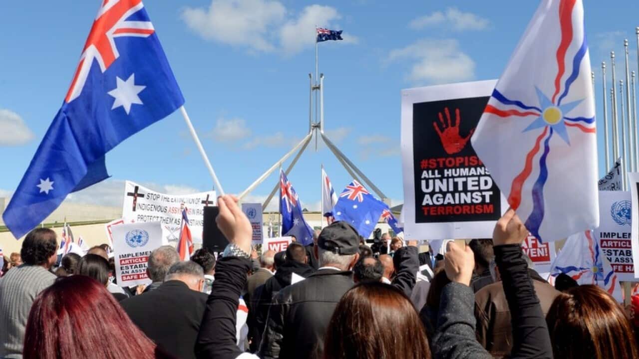 Assyrian community members protest in Canberra