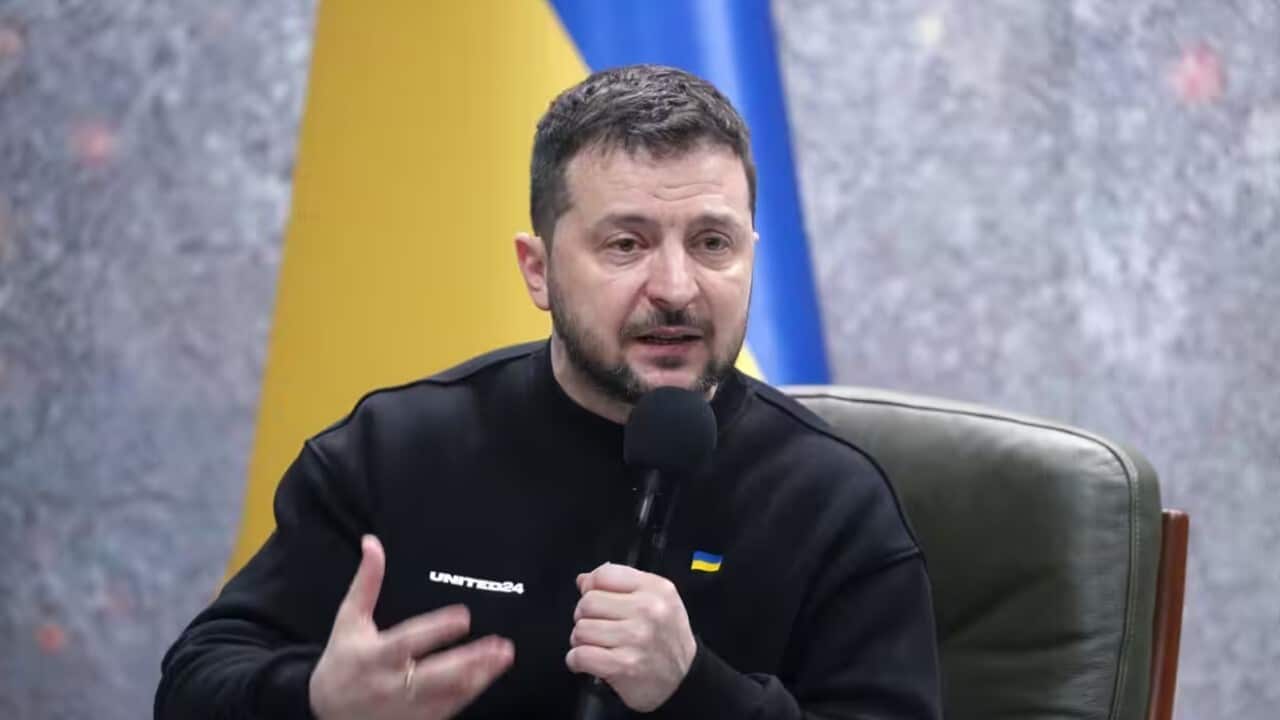 Ukrainian President Volodymyr Zelensky speaks to the media during a press conference in Kyiv.jpg