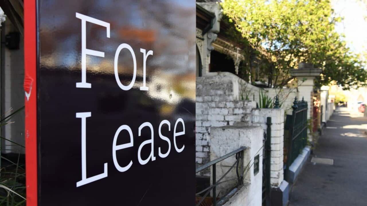Signage for a real estate property is seen in Carlton North, Melbourne, Wednesday, July 18, 2018. (AAP Image/James Ross) NO ARCHIVING